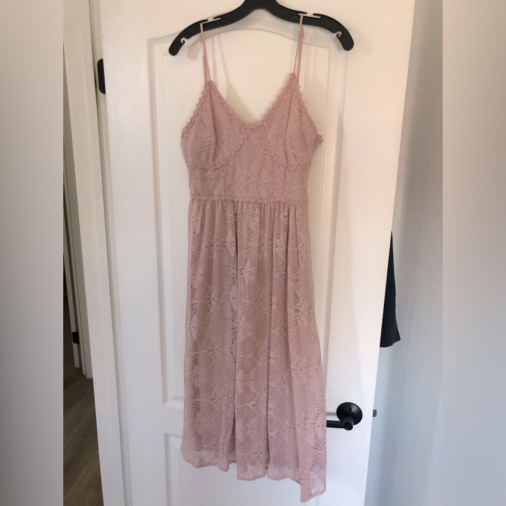 Light pink dress with lace detail. Size medium